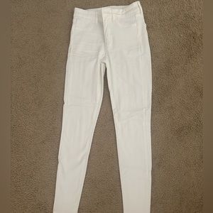 AMERICAN EAGLE white NEXT level stretch skinny jeans